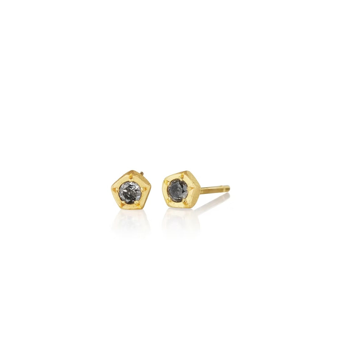 small grey diamonds set in hexagon gold settinh