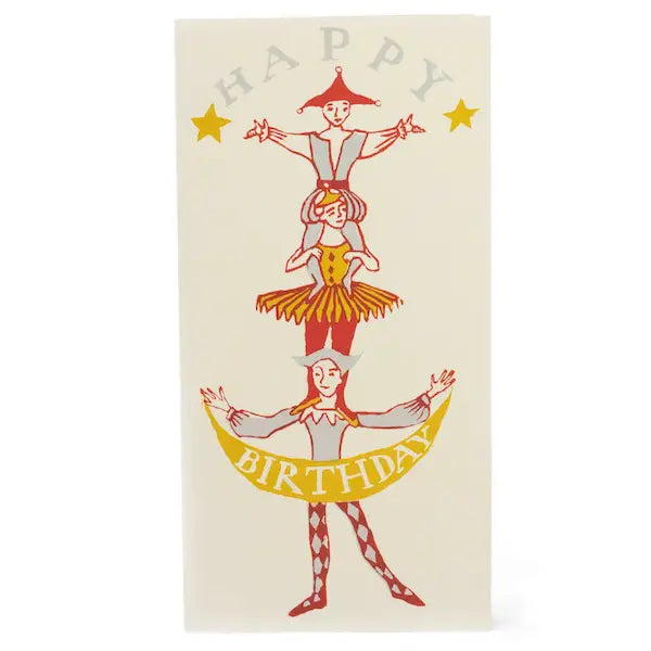 Tall birthday card with block print style illustration of dancers sitting in a human tower of three people