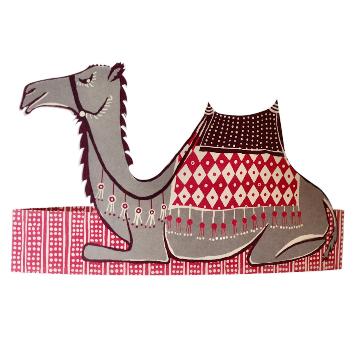 Decorative camel with a patterned saddle on a red and white checkered background