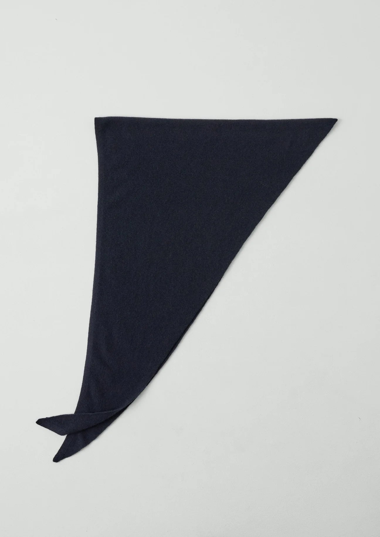 Navy blue triangular scarf on a light gray background