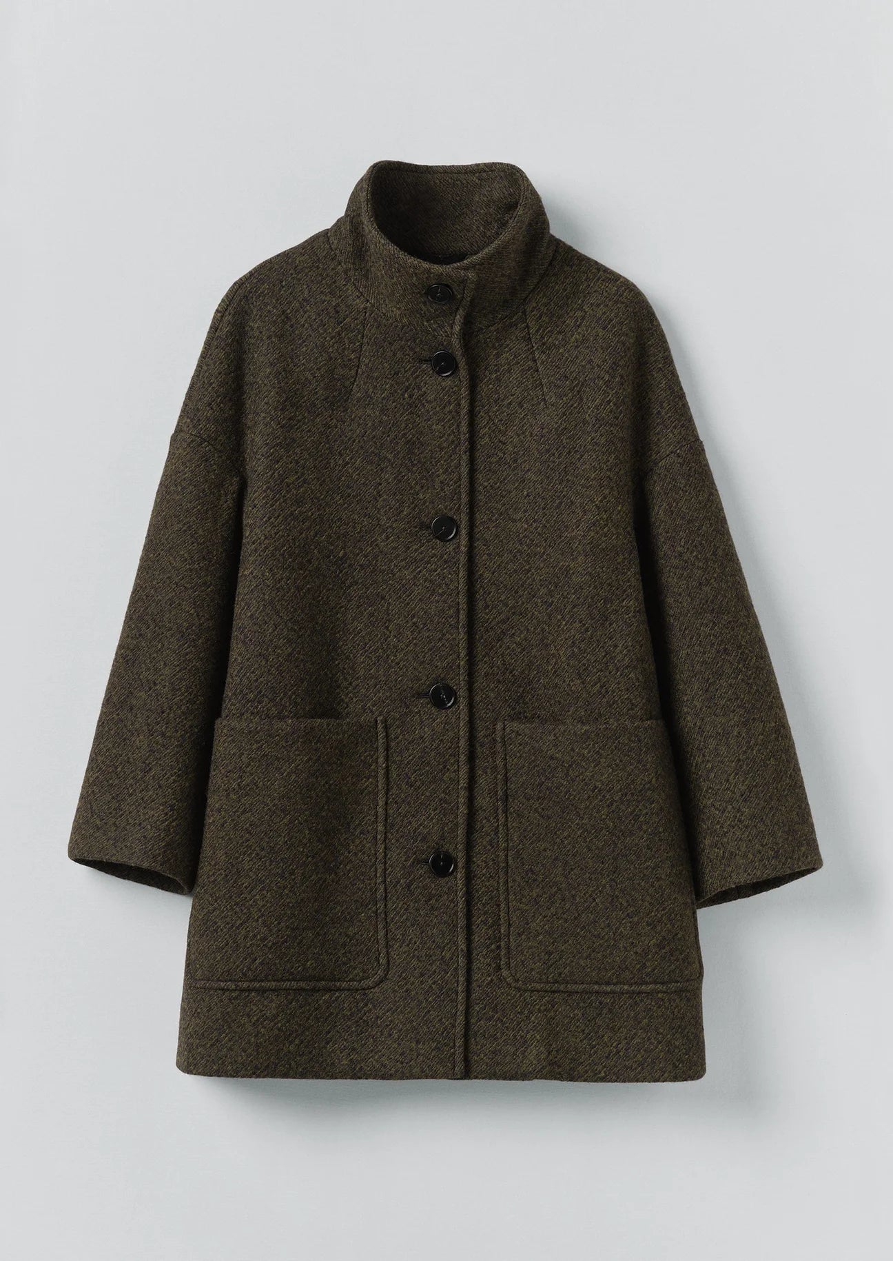 Brown coat with button details on a light gray background