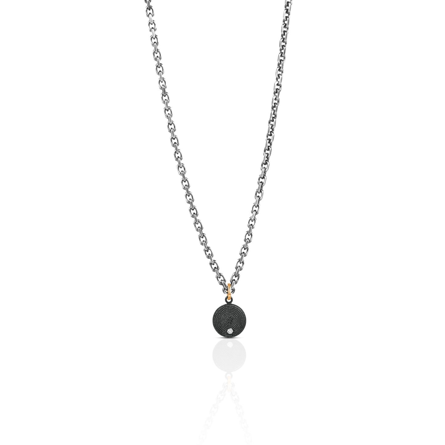 Necklace with a black pendant on a white background