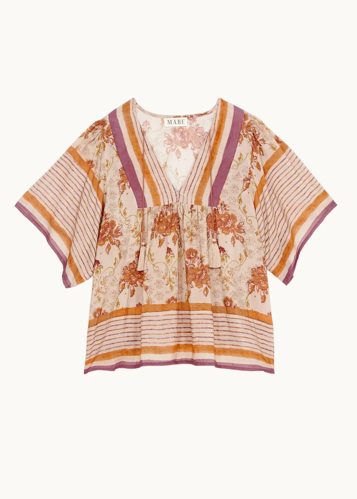 Floral patterned blouse with short sleeves on a white background