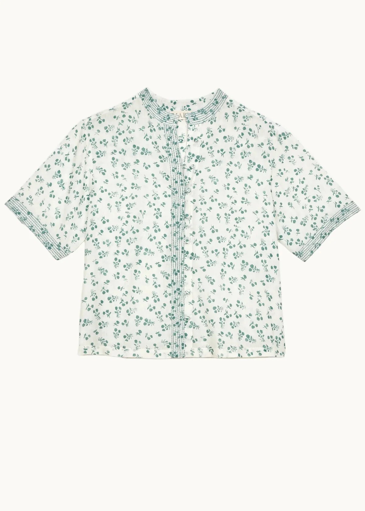 Short-sleeve shirt with a floral pattern on a white background