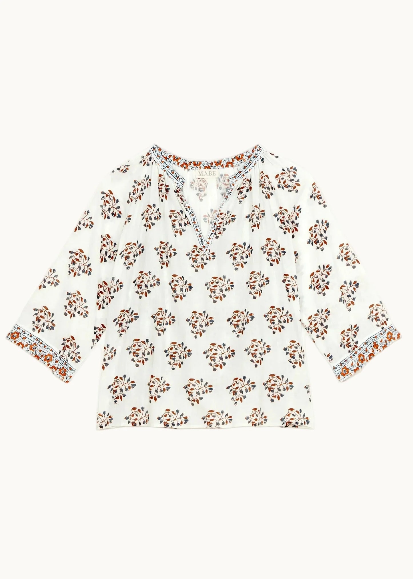 Floral-patterned top on a white background