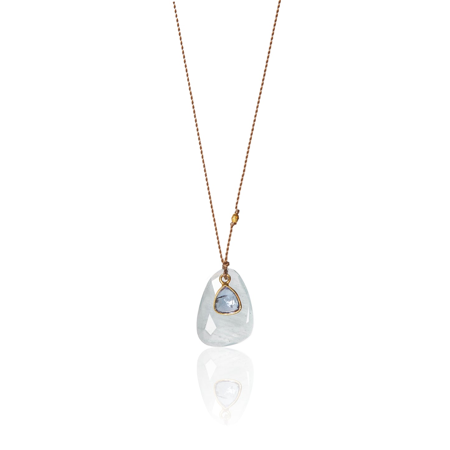 aquamarine and tanzanite faceted gem stone necklace on brown nylon cord