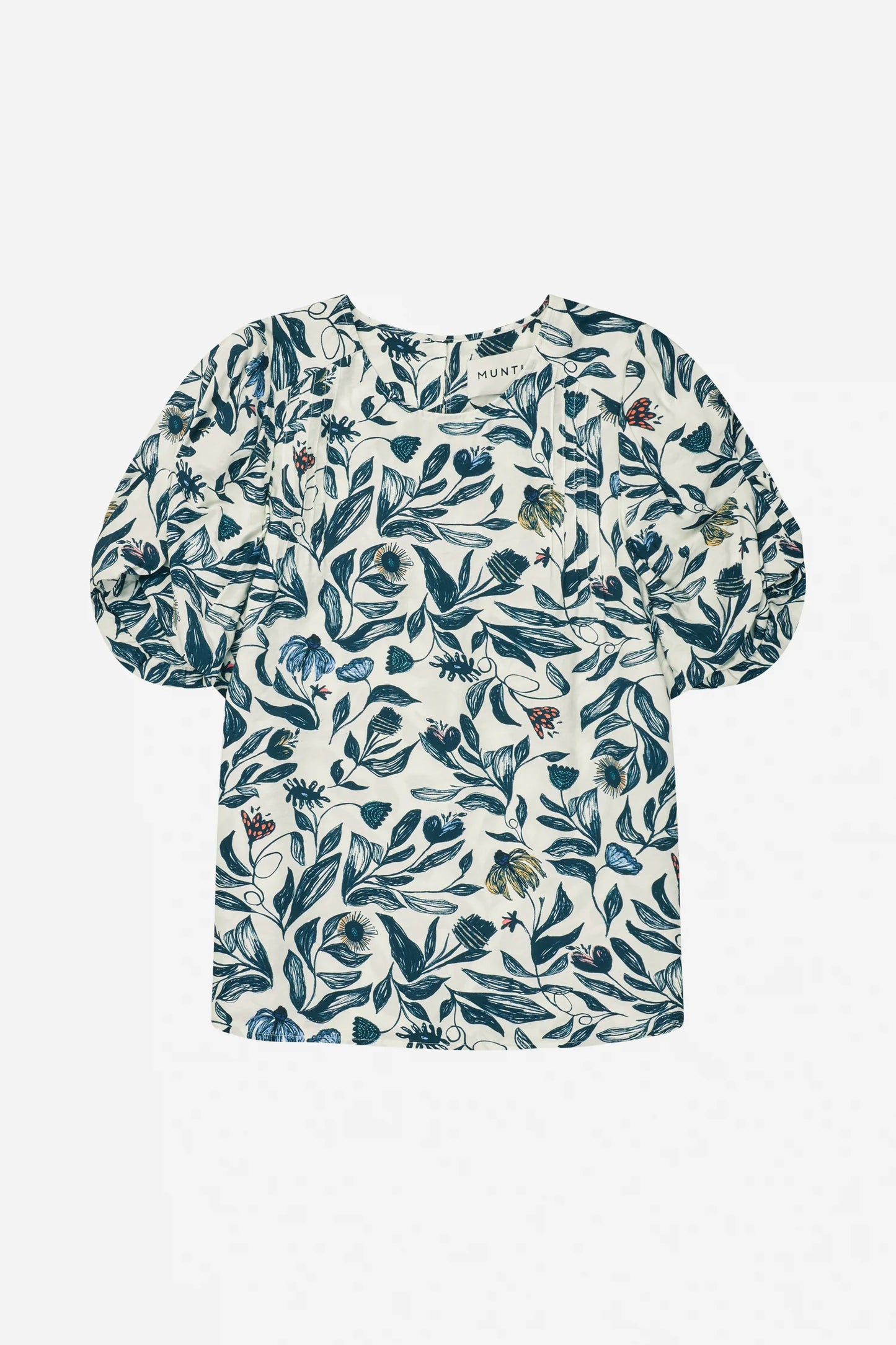 Floral patterned blouse on a white background