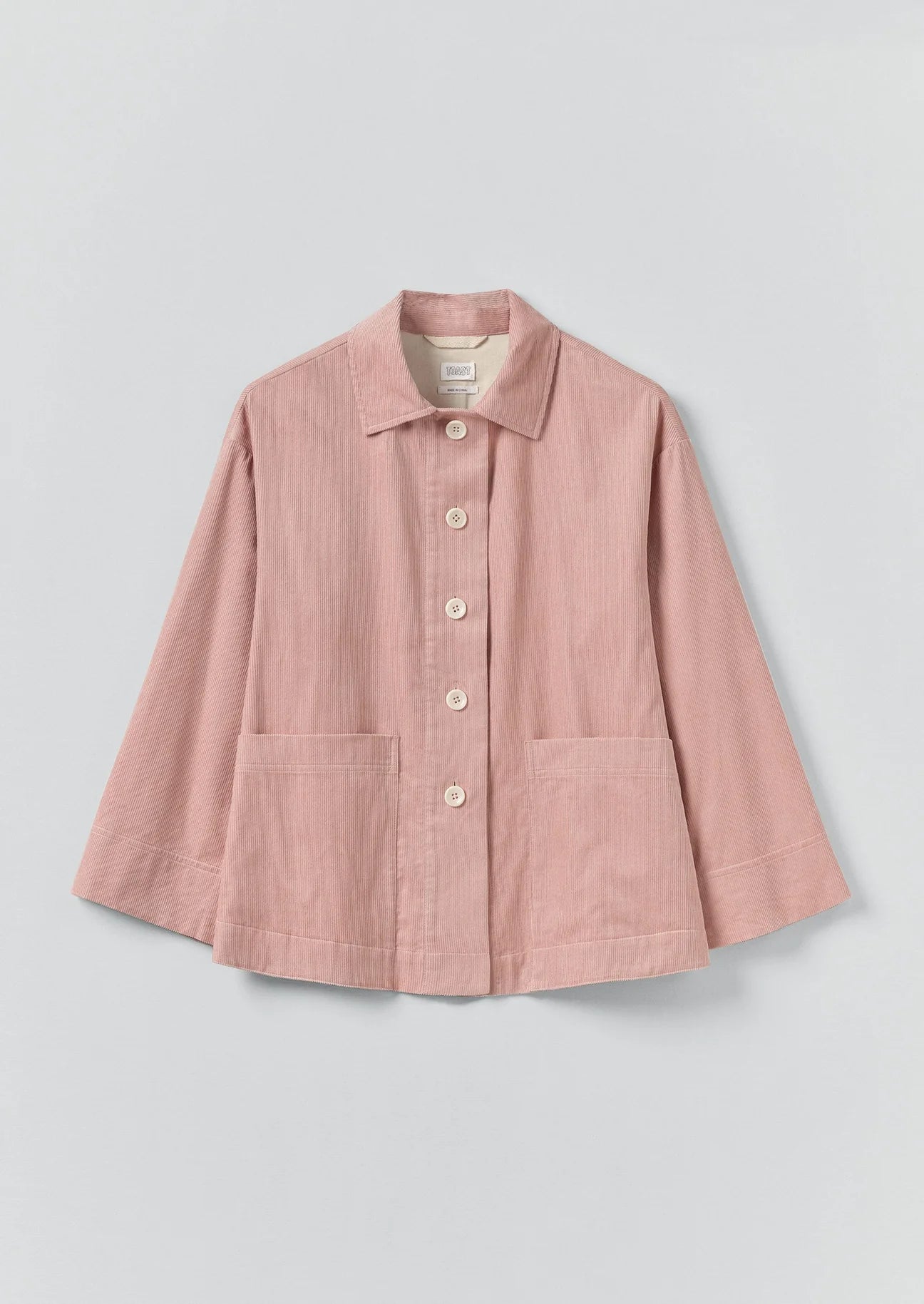 Pink jacket on a light gray background