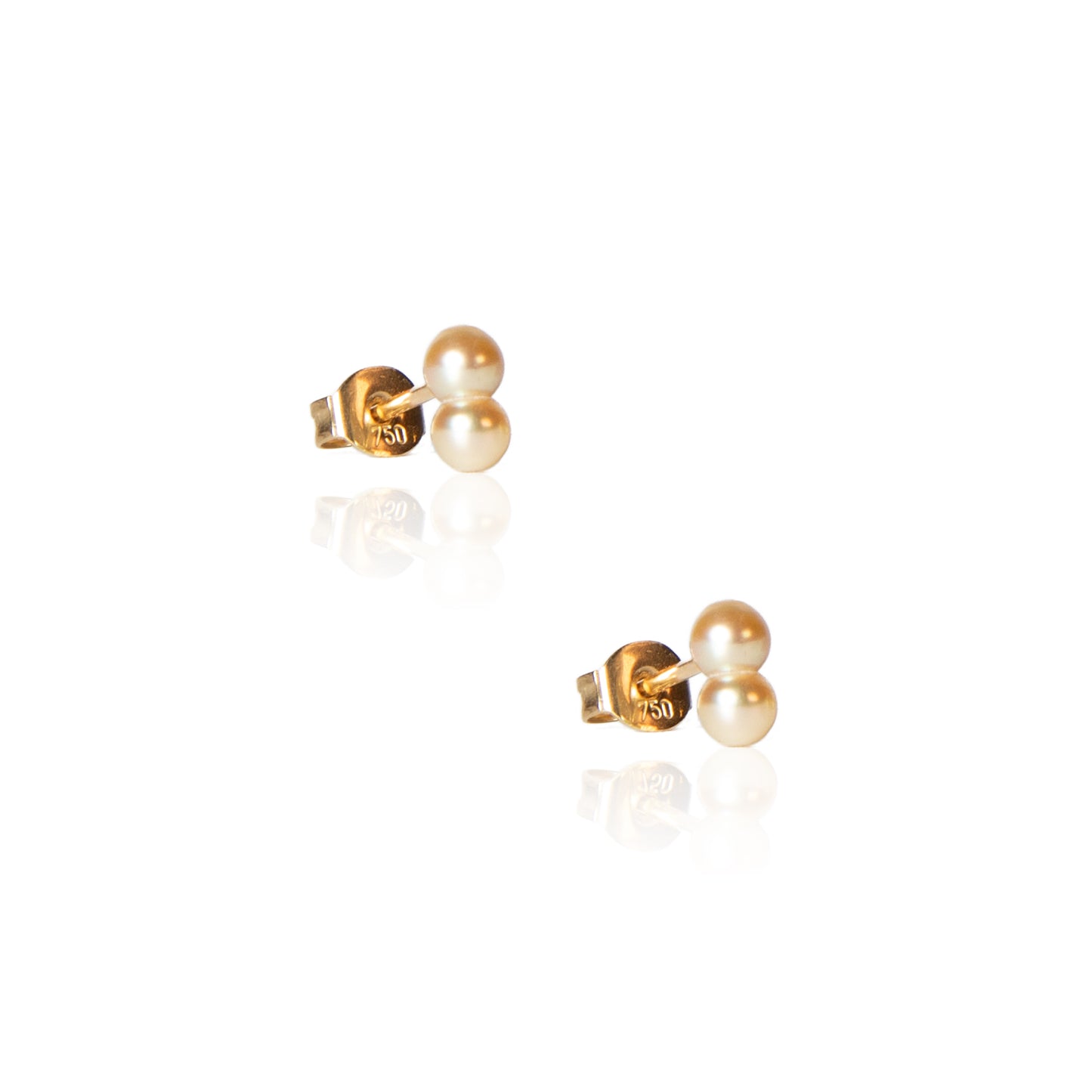 pair of tiny double white pearl post earrings with gold posts