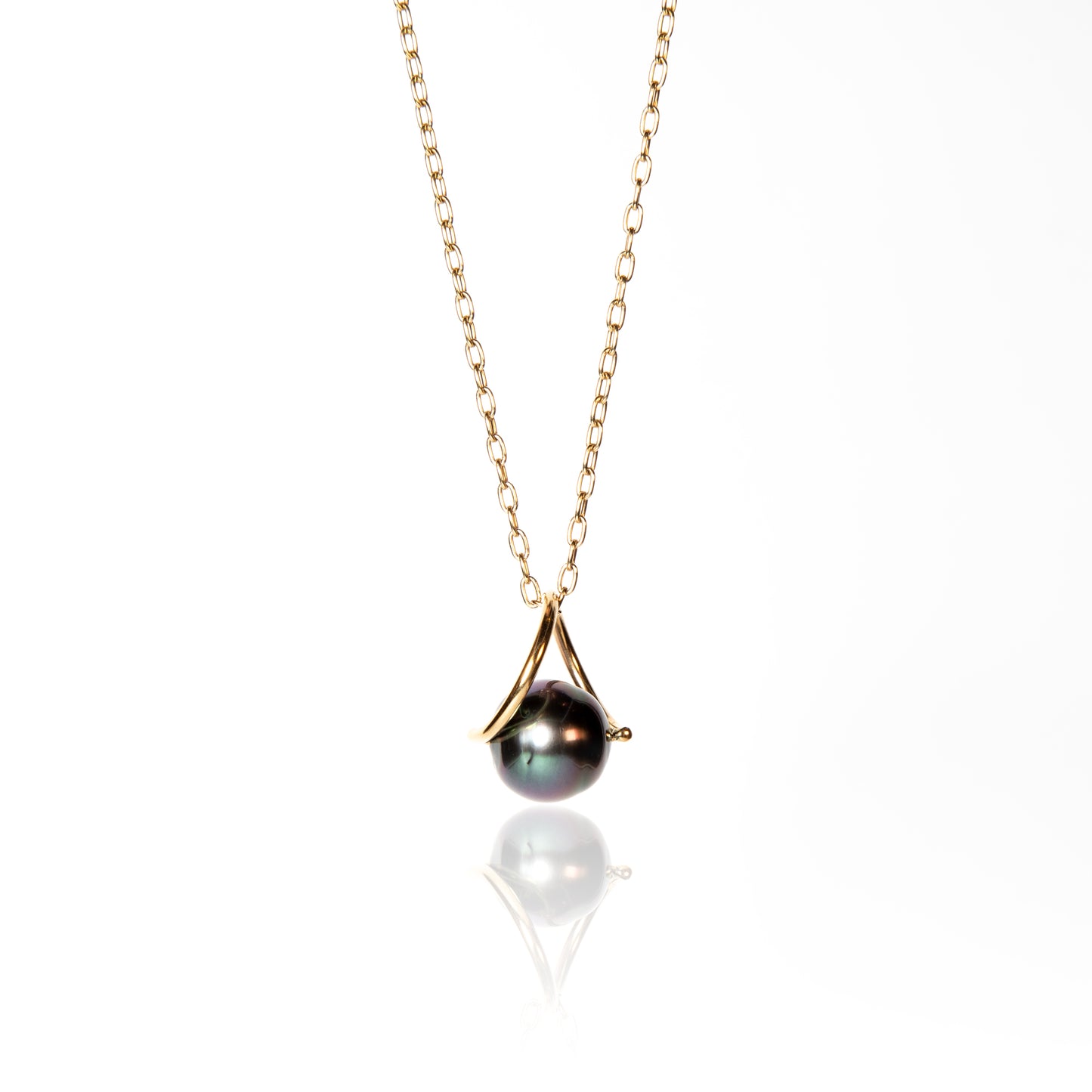 Green Tahitian pearl with gold twist setting on 18k yellow gold chain