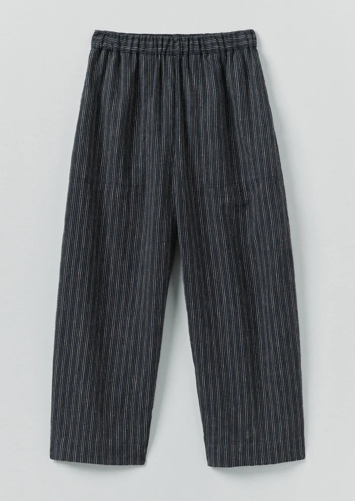 Striped pants on a light gray background
