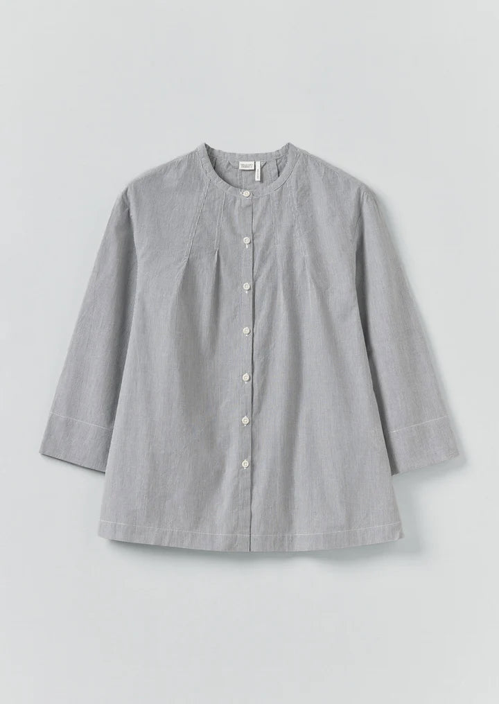 Gray button-up shirt on a light gray background