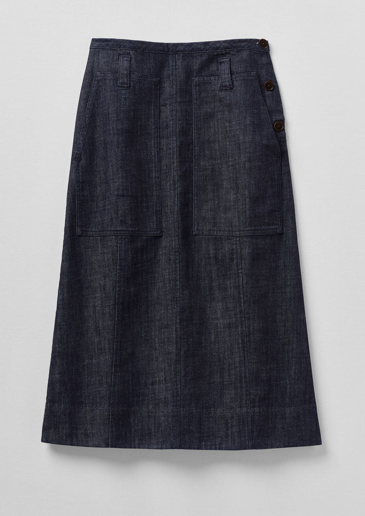 Dark denim skirt on a light gray background