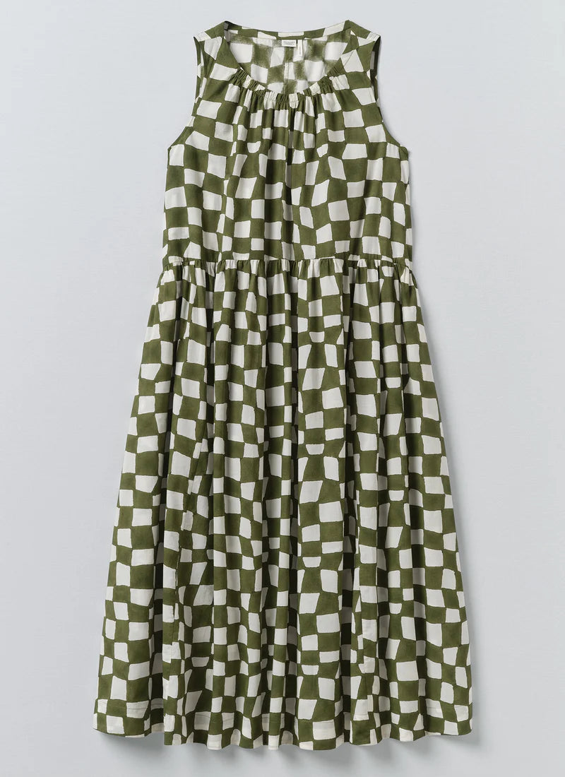 Green and white checkered dress on a light gray background
