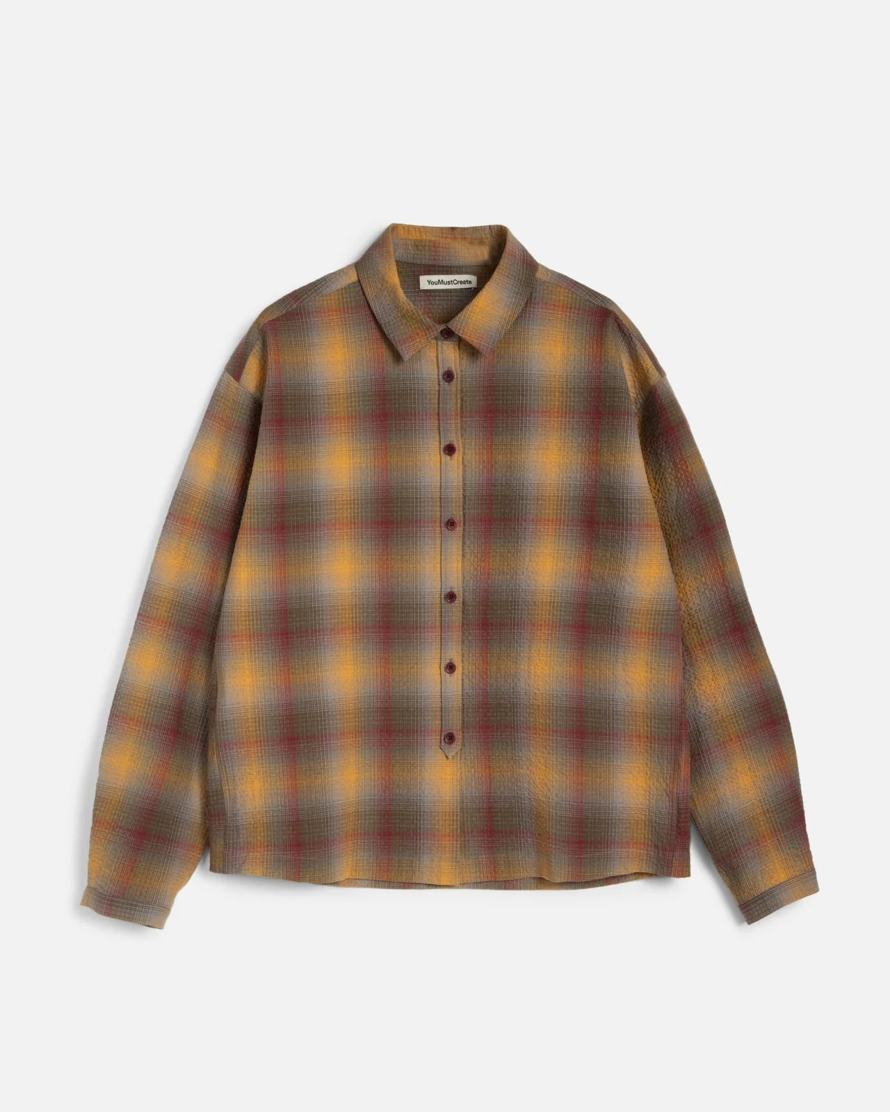 Plaid shirt with brown and yellow pattern on a white background