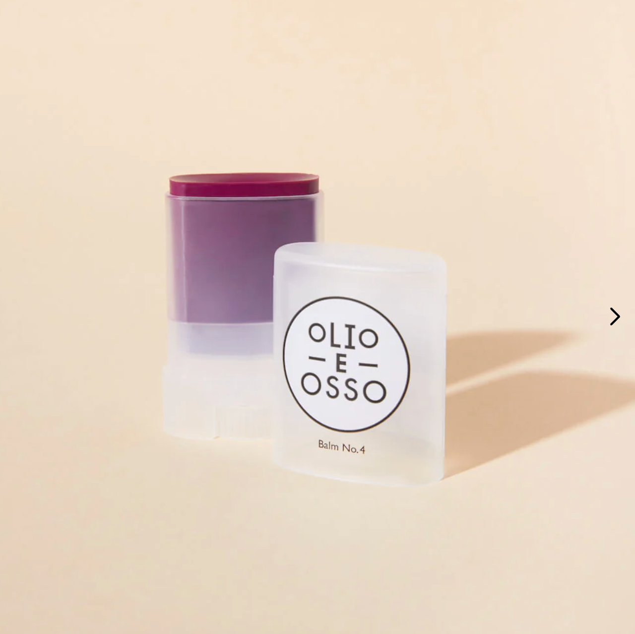 Olio E Osso beauty balm  on a beige background