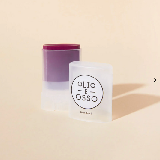 Olio E Osso beauty balm  on a beige background