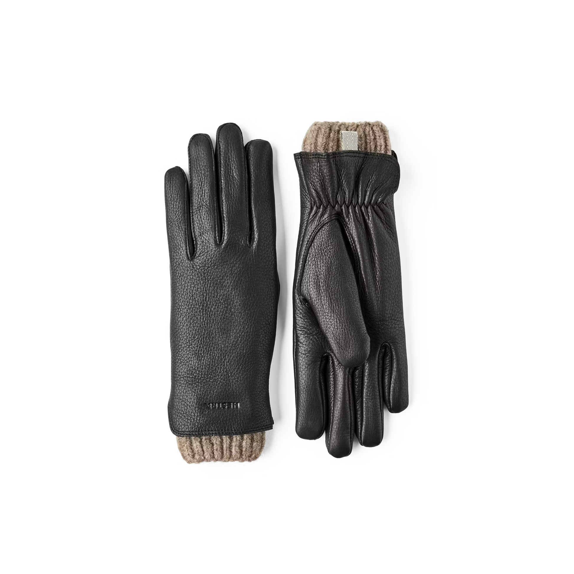 Pair of black leather gloves with brown trim on a white background