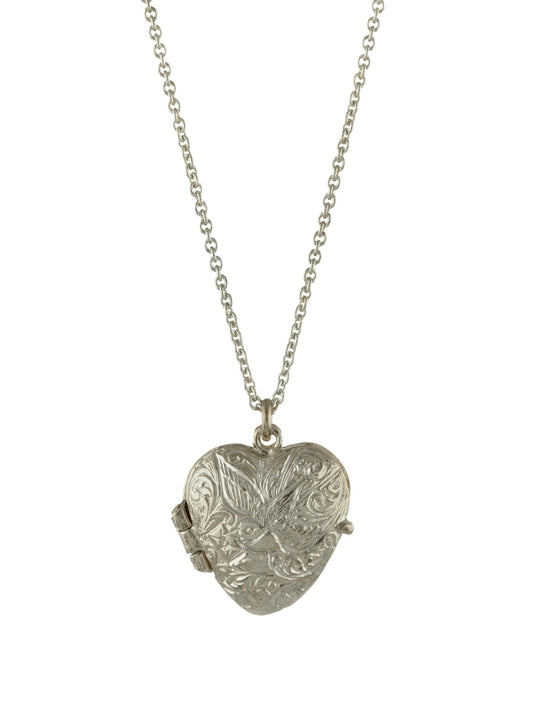 Silver heart-shaped locket on a chain against a white background
