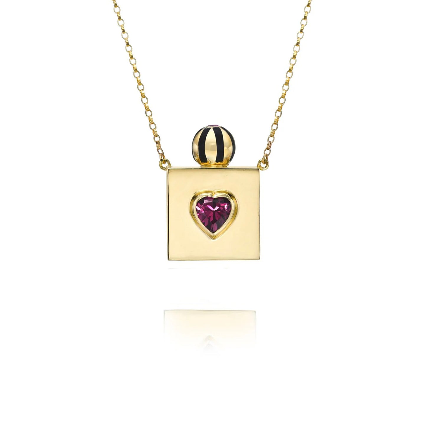 Gold necklace with a heart-shaped gemstone pendant on a white background