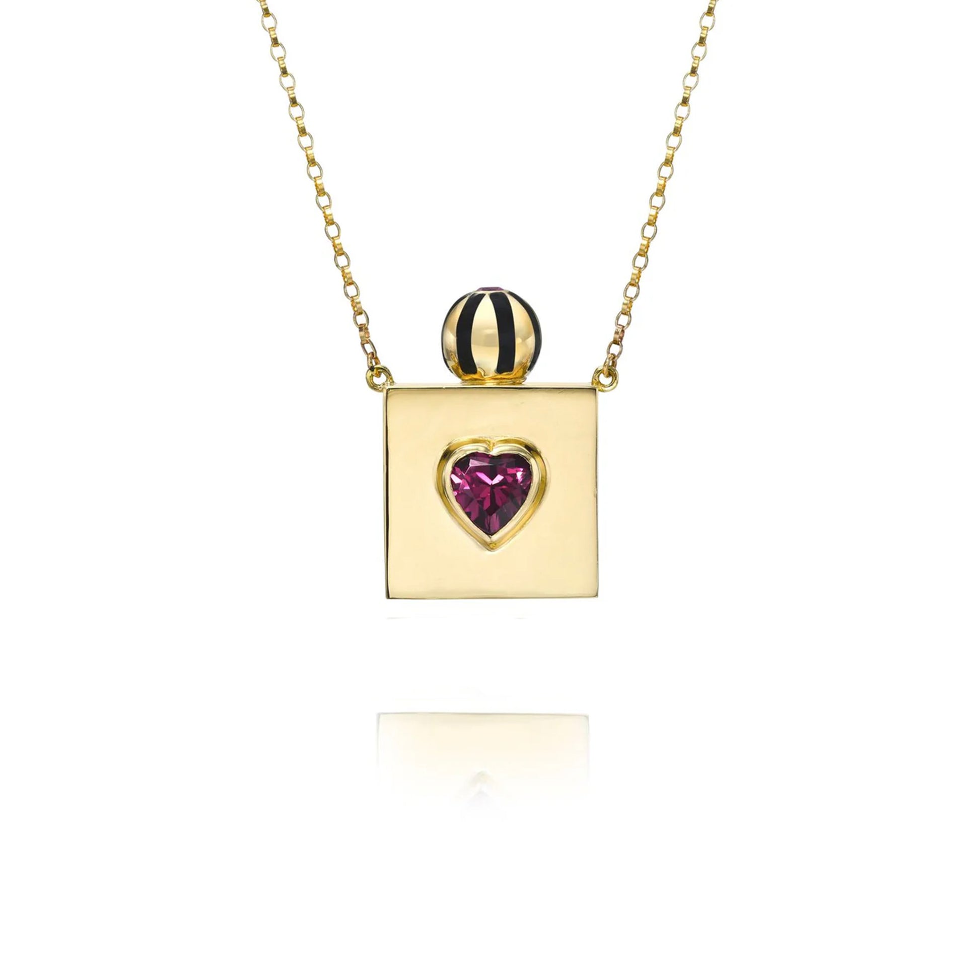 Gold necklace with a heart-shaped gemstone pendant on a white background