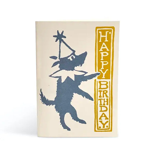 Birthday card with wolf design and 'Happy Birthday' text on a beige background