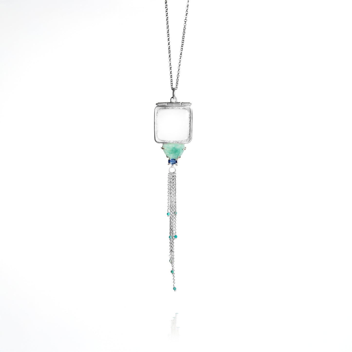 Necklace with a square pendant and chain on a white background