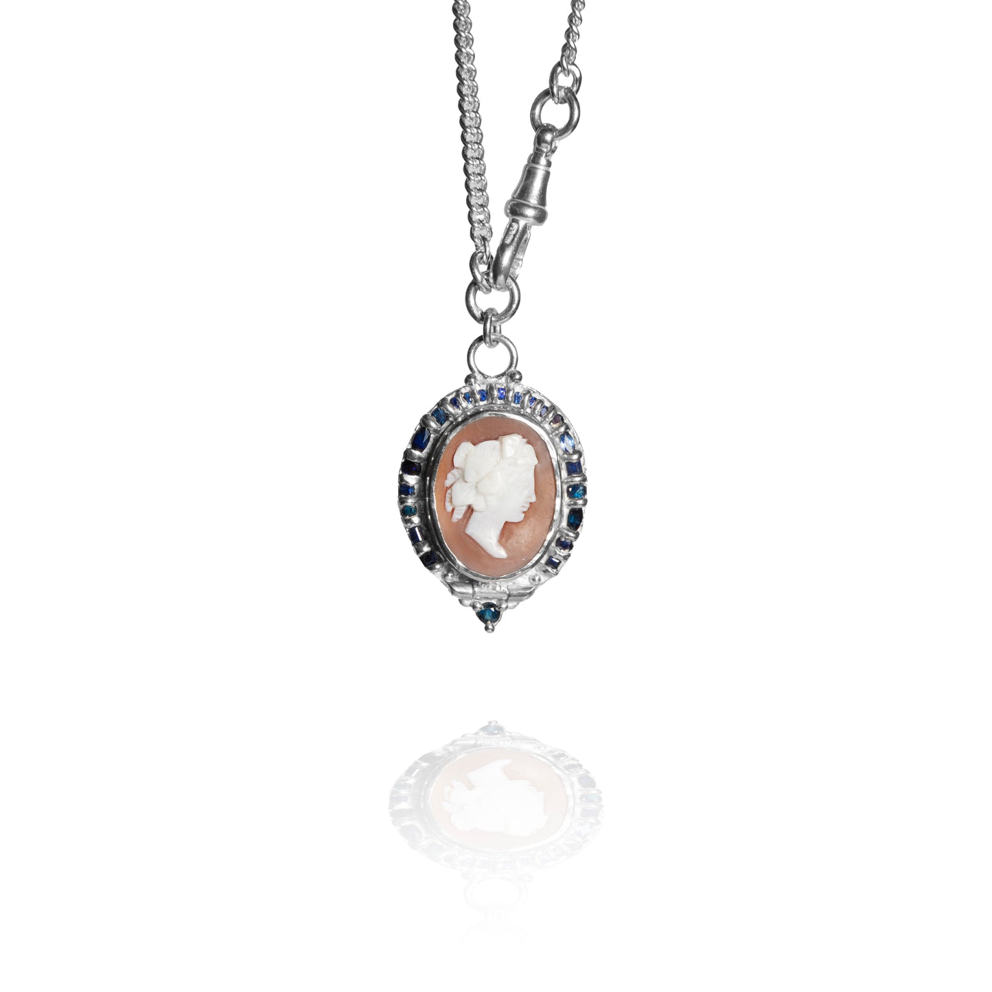 Silver necklace with a cameo pendant on a white background