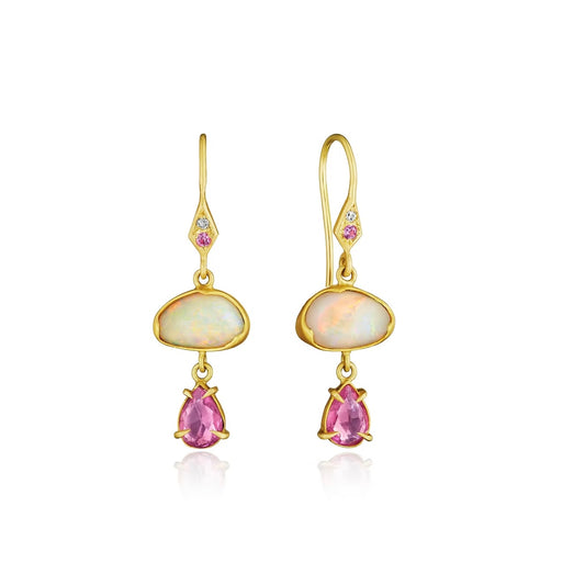White oval shaped drop earrings with prong set pink sapphires