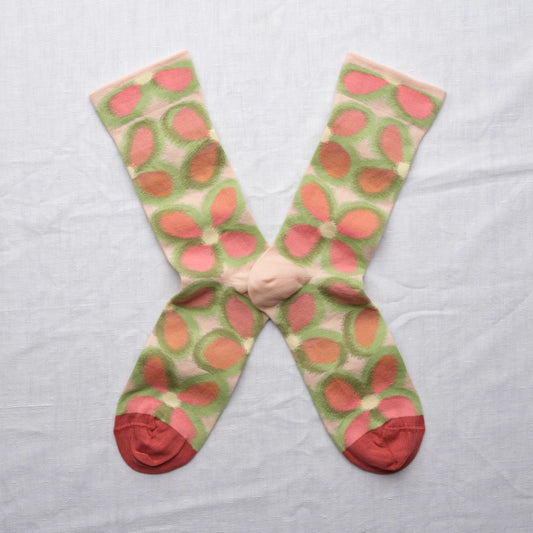 Colorful patterned socks on a light gray background