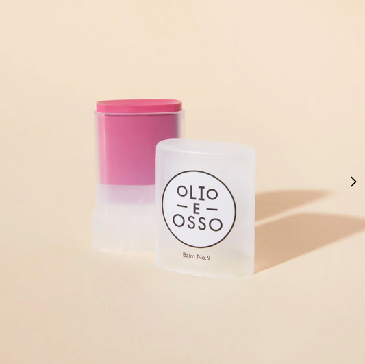 Olio E Osso beauty balm on a beige background