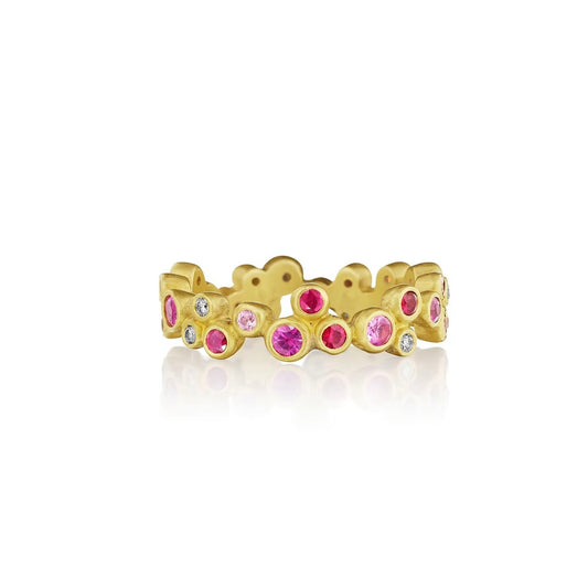 Gold ring with pink sapphires and white diamonds set in bubble shapes