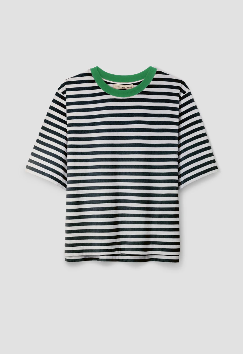Black and white striped t-shirt with green trim on a light gray background