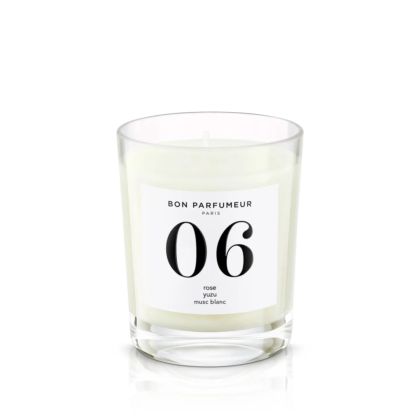 Scented candle by Bon Parfumeur in a glass.