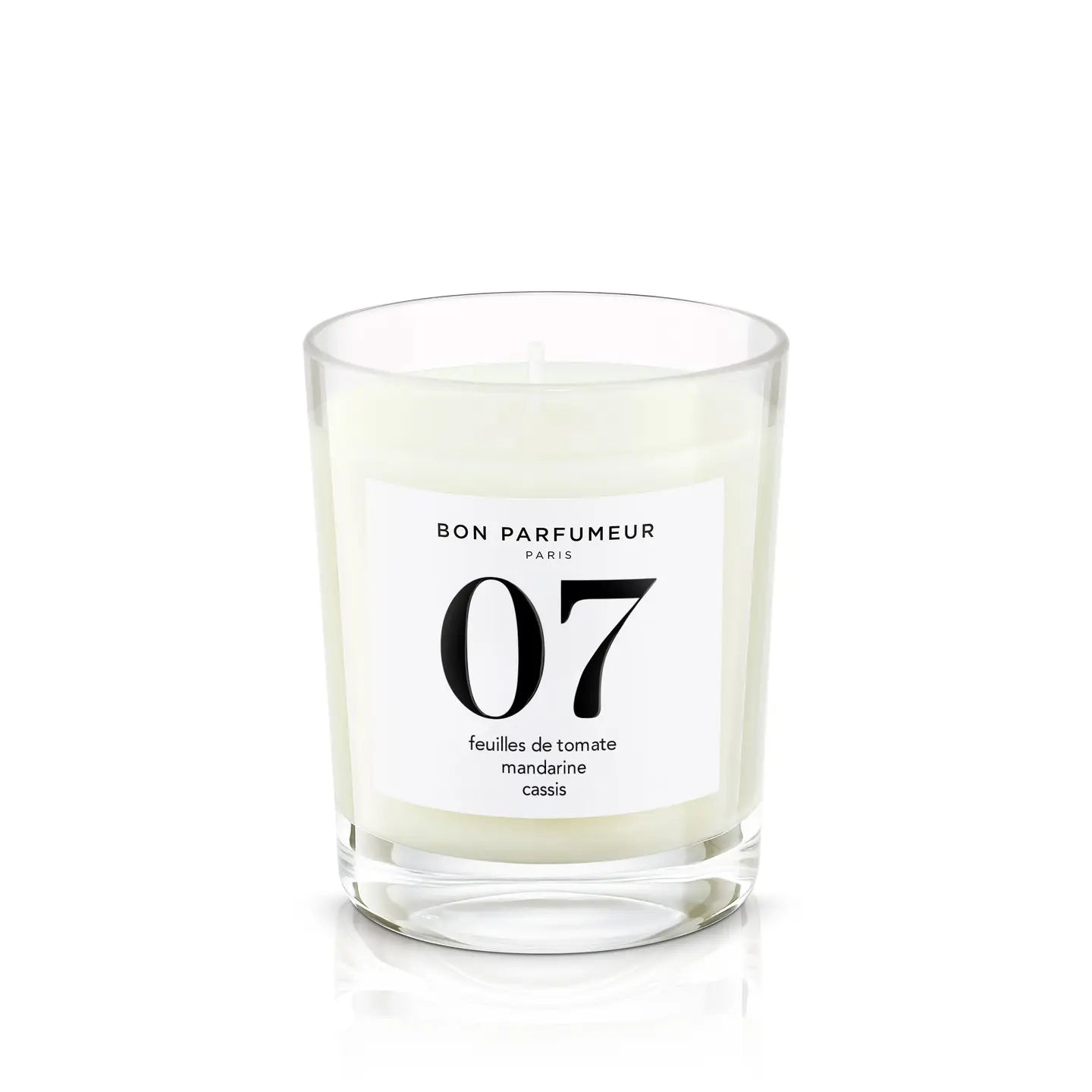 A scented candle by Bon Parfumeur in a glass