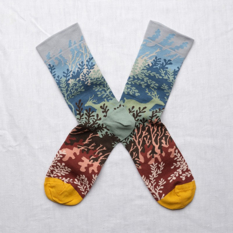 Pair of socks with colorful leaf motif