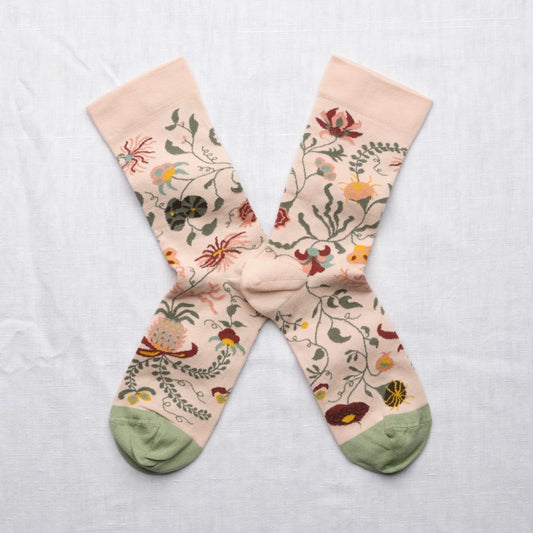 pair of socks with tropical flower motif