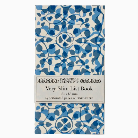 Note book with dappled blue illustration on cover