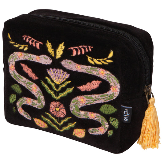A black velvet travel pouch with a zipper and tassel closure and an embroidered floral design with snakes.