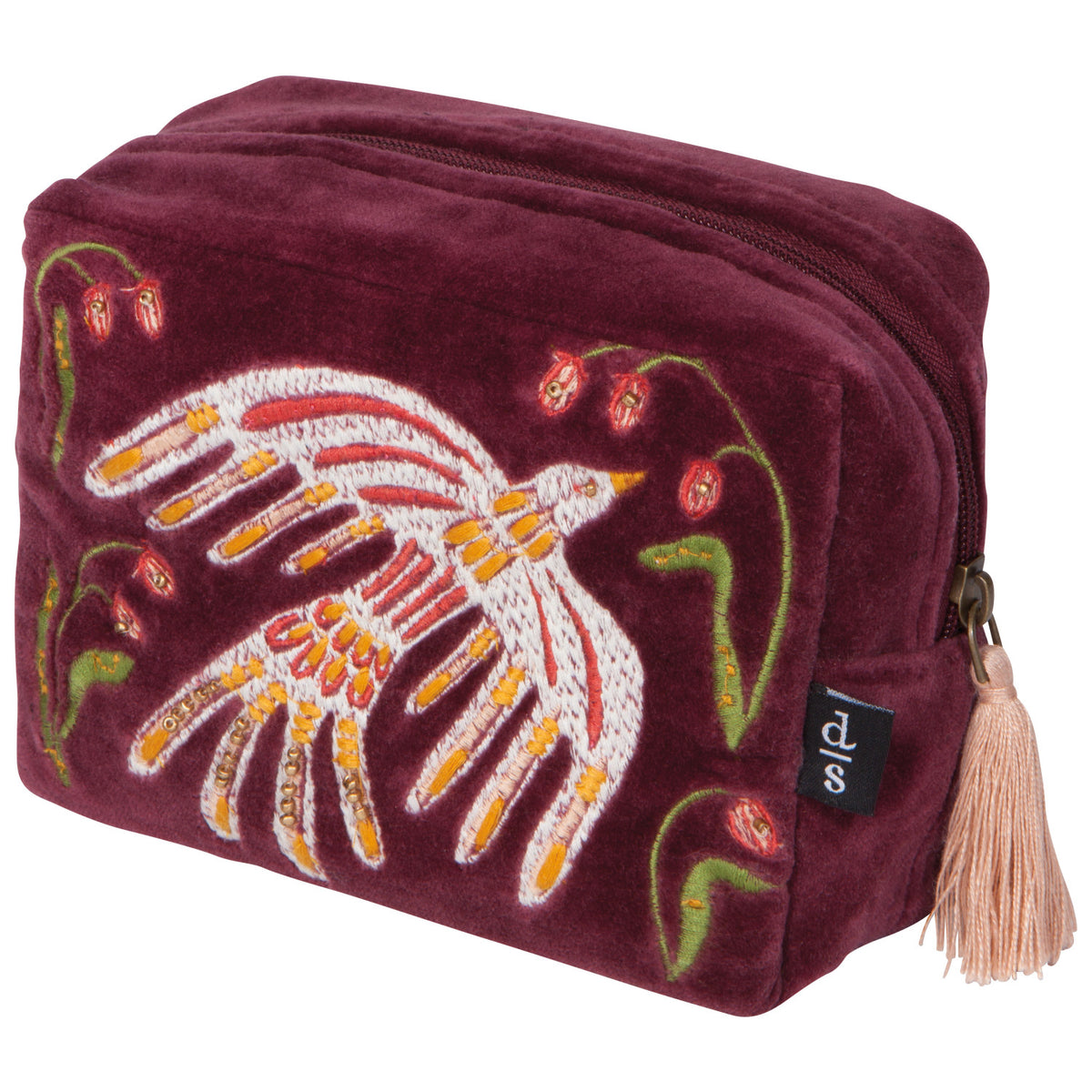 A plum-colored velvet travel pouch with a zipper and tassel closure and an embroidered floral design with a bird.