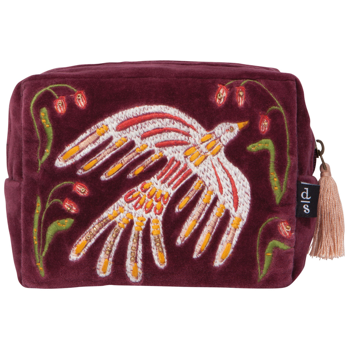 A plum-colored velvet travel pouch with a zipper and tassel closure and an embroidered floral design with a bird.