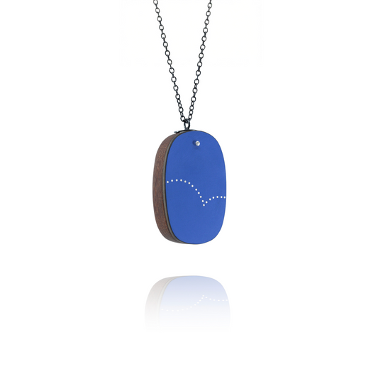 Blue pendant necklace on a white background