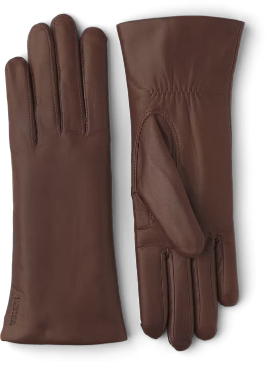 Pair of brown leather gloves on a white background