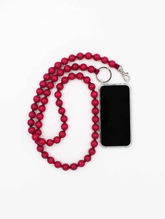 Red beaded phone lanyard with a phone case on a white background