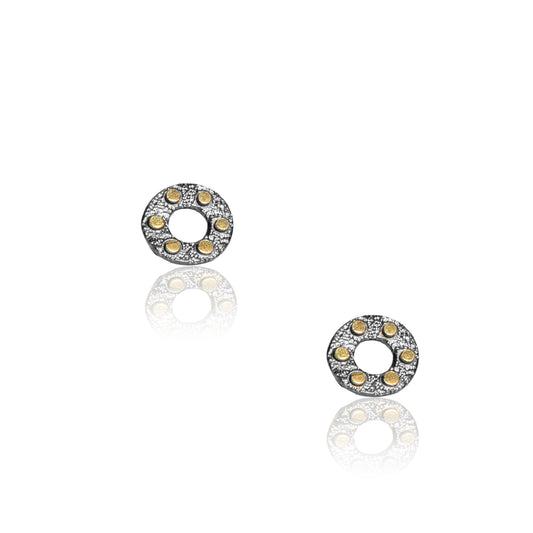 Small circle earrings in oxidized silver with six tiny gold dots on each by Joanna Gollberg