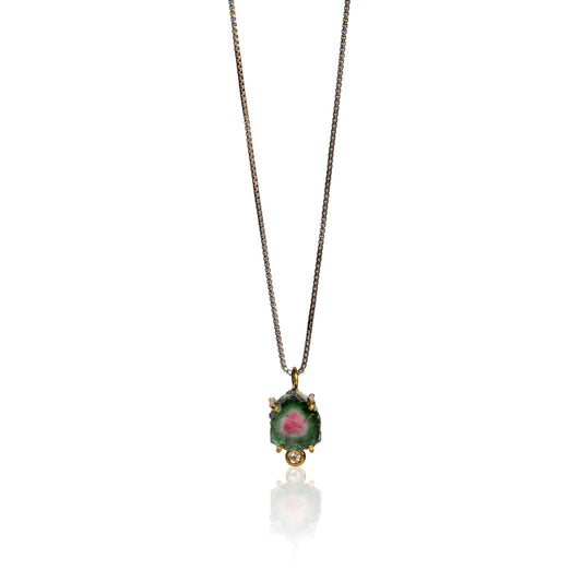 Watermelon tourmaline slice pendant with gold prongs and bezel set tiny diamond by Joanna Gollberg
