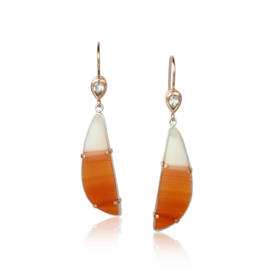 rose gold dangle earrings with carnelian and pear shaped white sapphires
