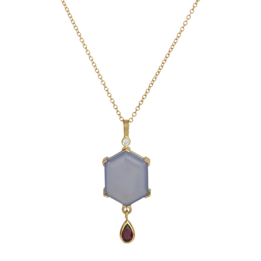 Hexagon shaped chalcedony necklace with garnet and diamond highlights on an 18k gold chain