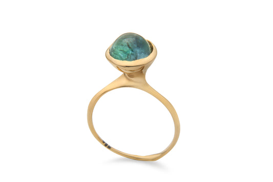 Gold ring with single green tourmaline gemstone