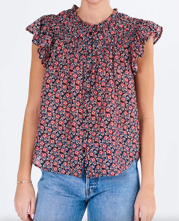 Button front, floral print M.A.B.E Ara top with flutter sleeves. Relaxed fit, worn with blue wash jeans